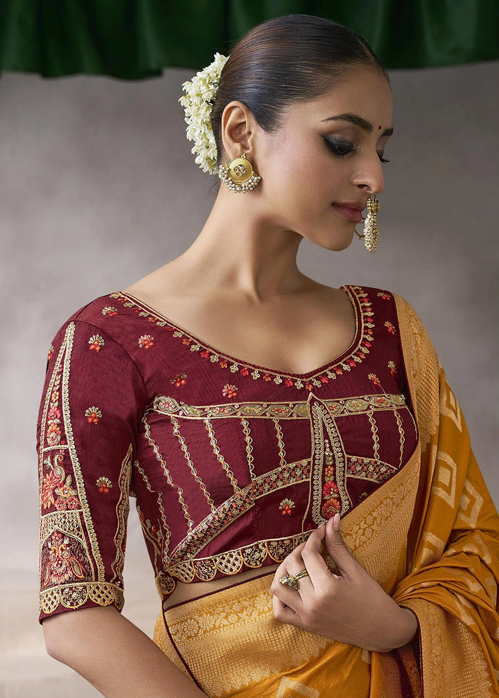 Pumpkin Orange Crepe Silk Saree with Contrast Embroidered Blouse