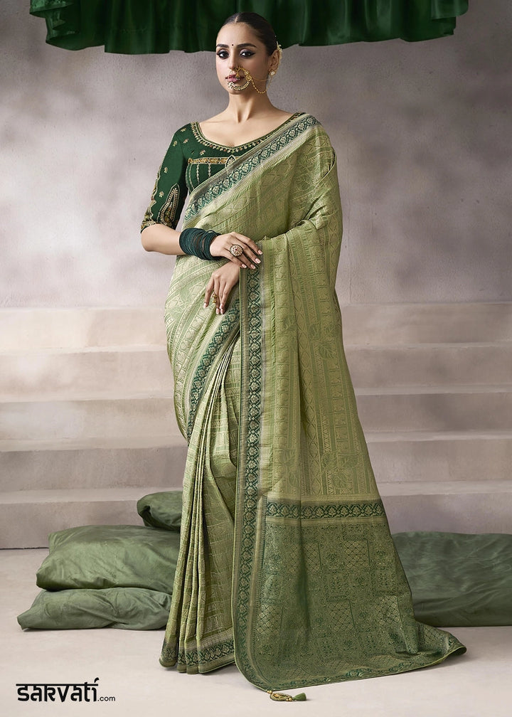 Light Green Crepe Silk Saree with Contrast Embroidered Blouse