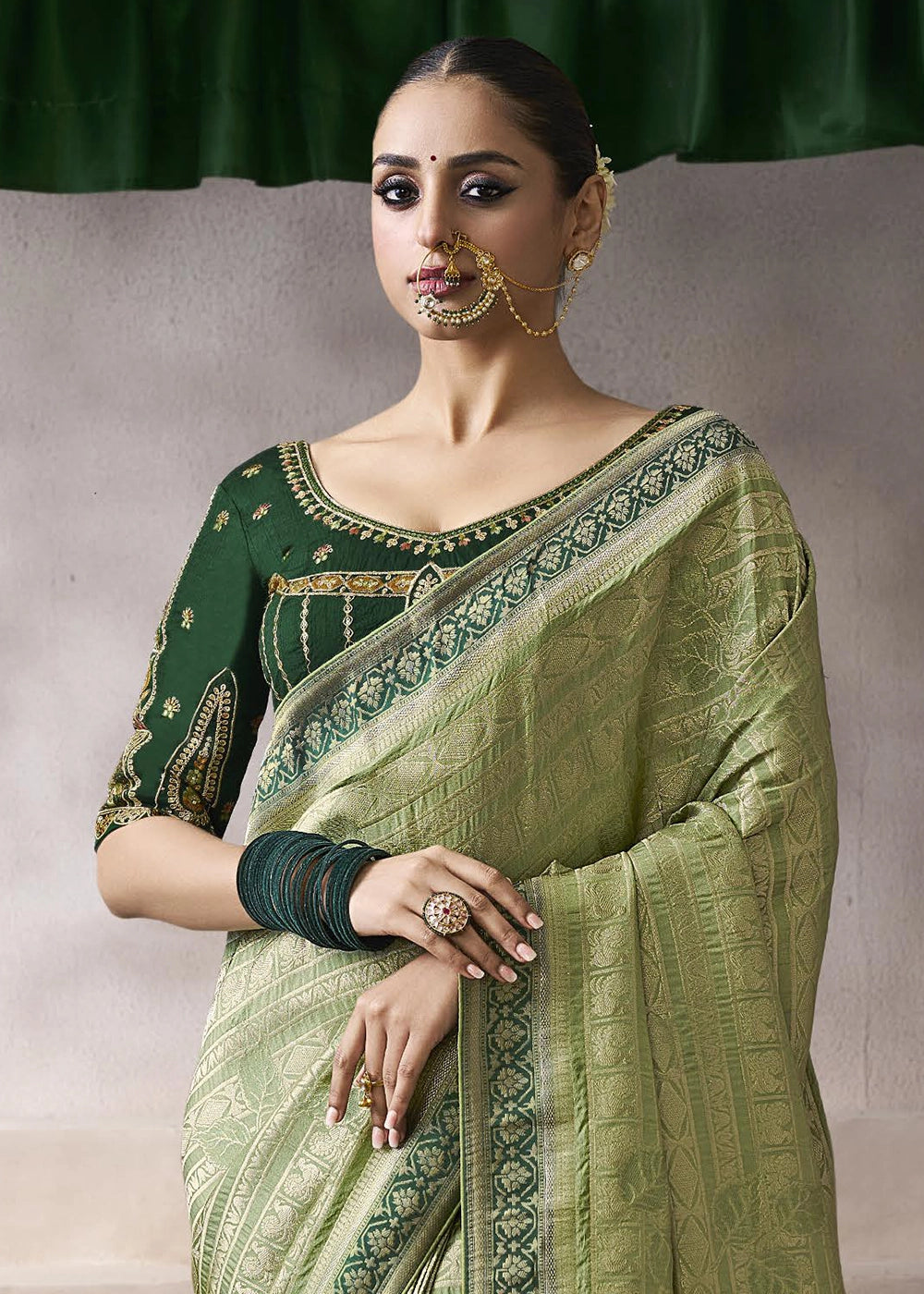 Light Green Crepe Silk Saree with Contrast Embroidered Blouse