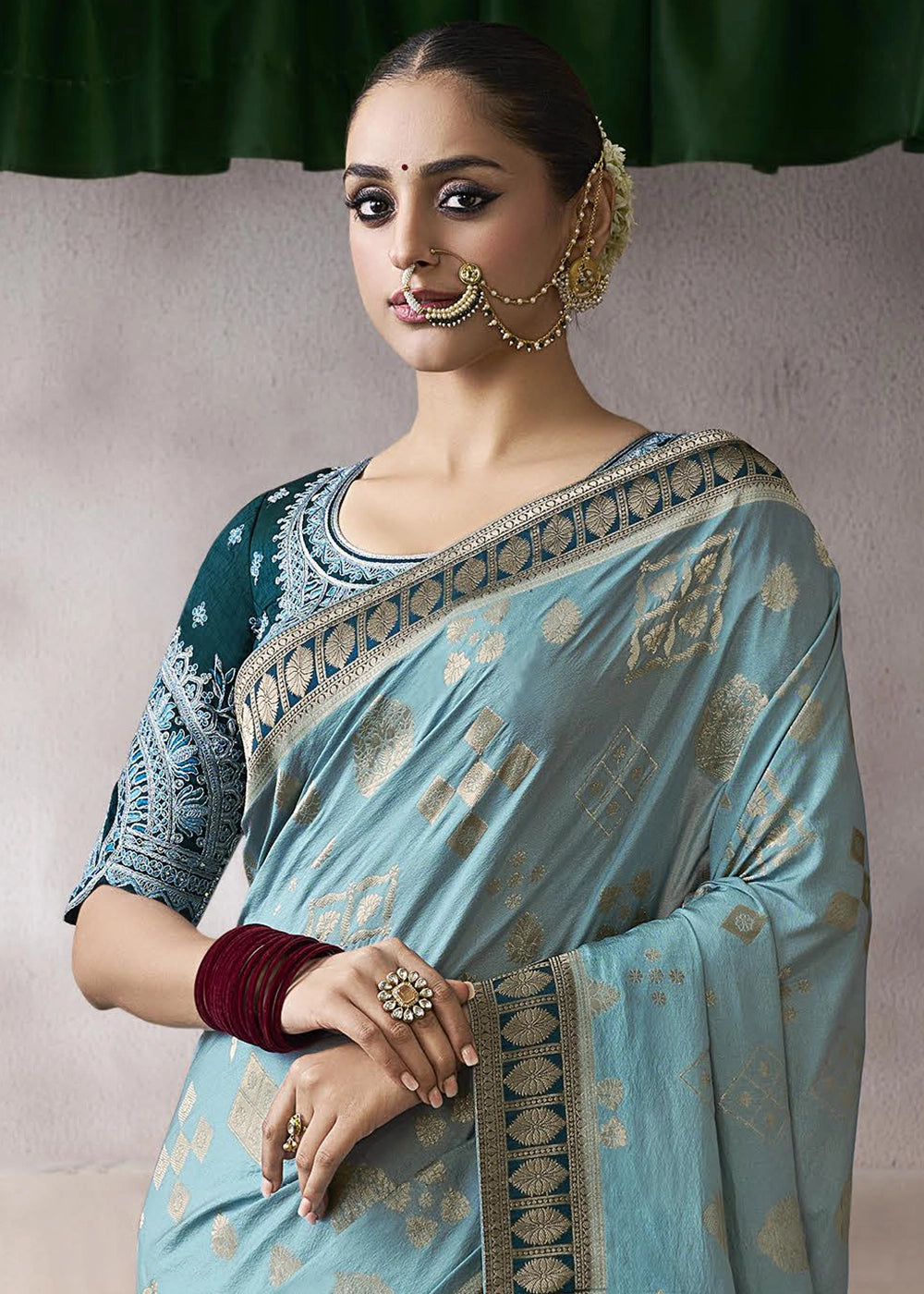 Celeste Blue Crepe Silk Saree with Contrast Embroidered Blouse