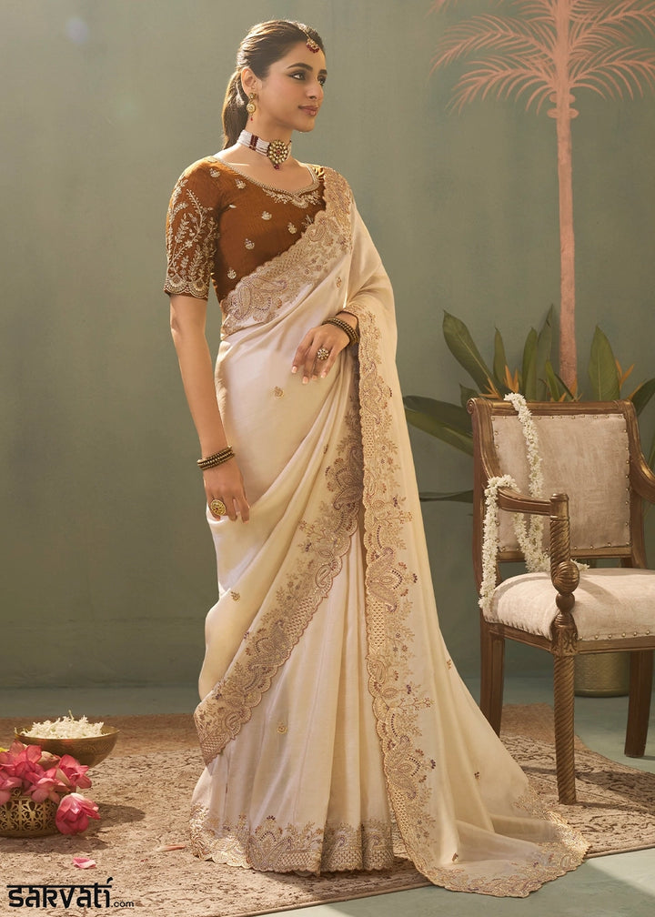 Pearl White Uppada Silk Saree with Delicate Embroidered Detailing