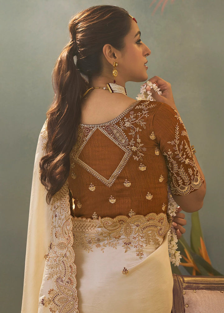 Pearl White Uppada Silk Saree with Delicate Embroidered Detailing