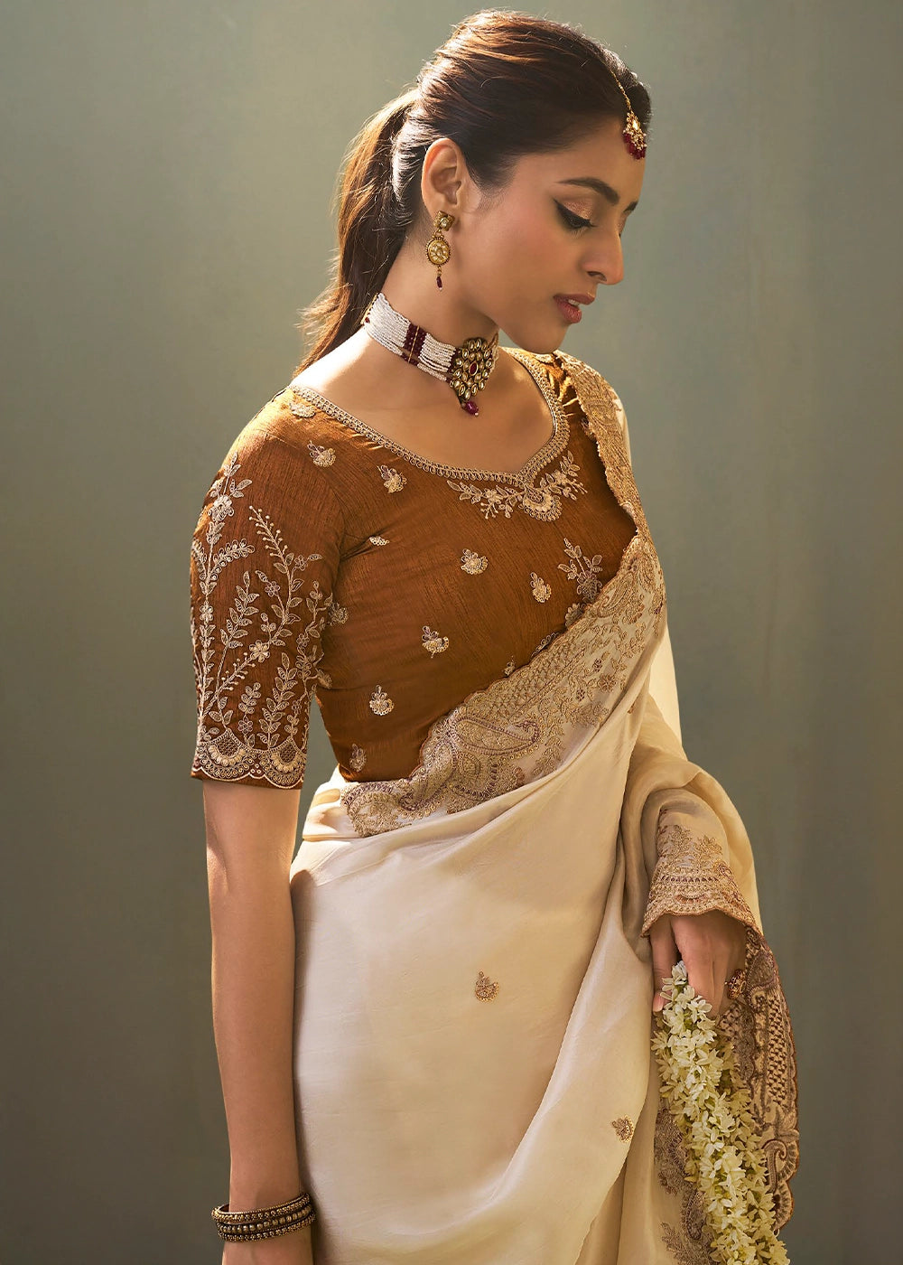 Pearl White Uppada Silk Saree with Delicate Embroidered Detailing