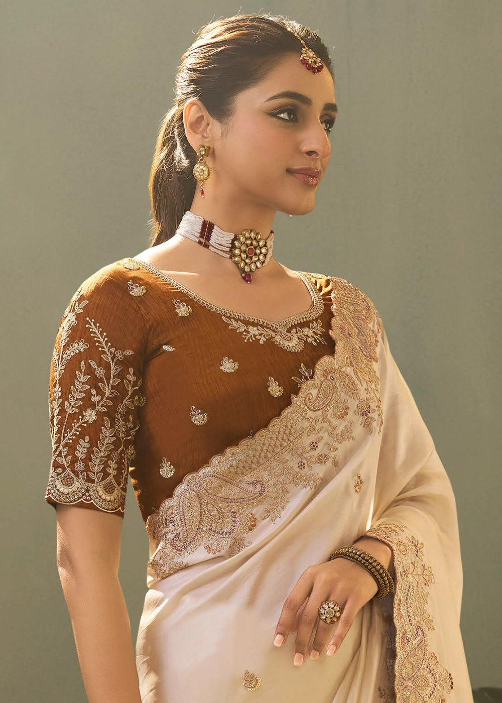 Pearl White Uppada Silk Saree with Delicate Embroidered Detailing