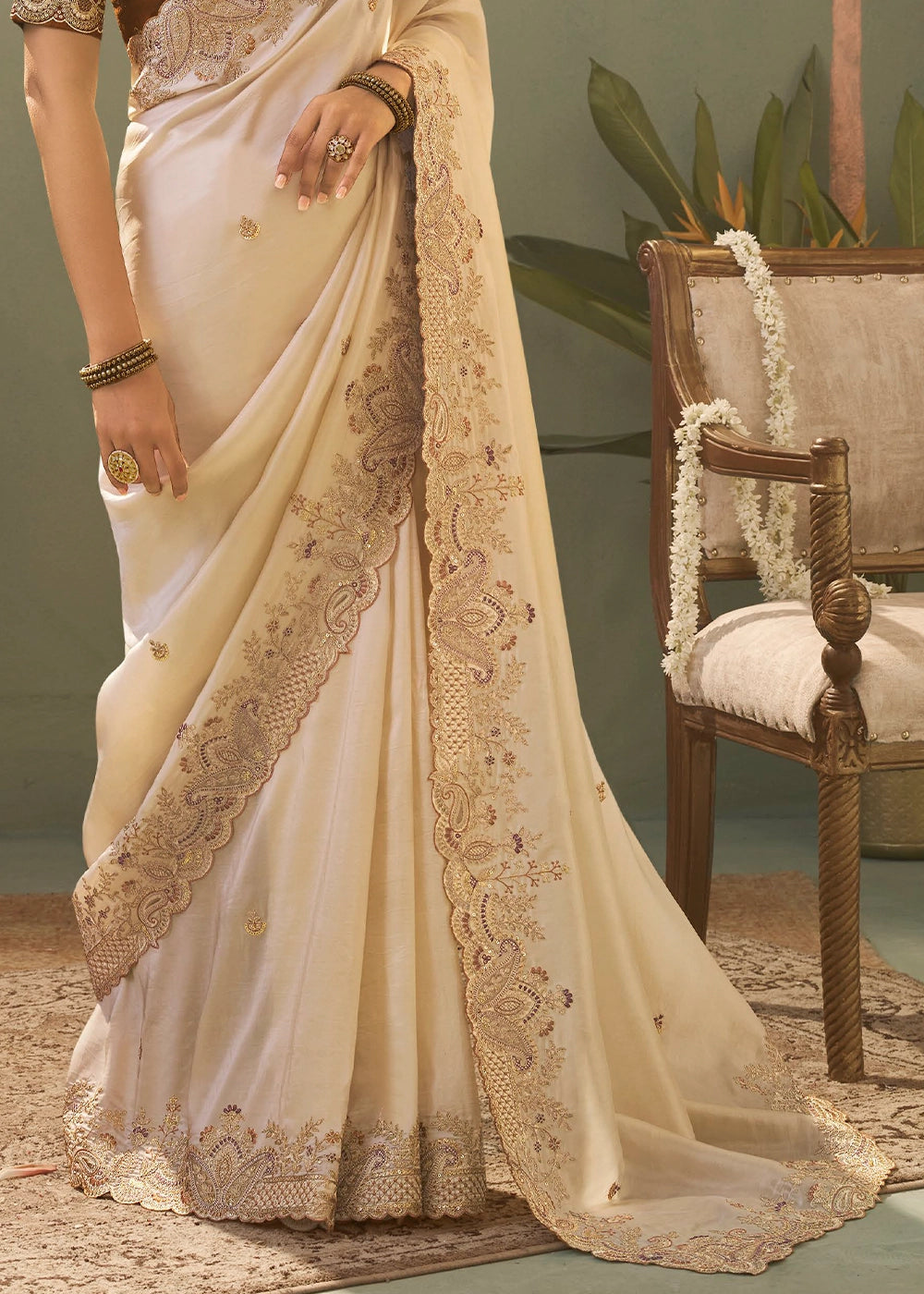 Pearl White Uppada Silk Saree with Delicate Embroidered Detailing