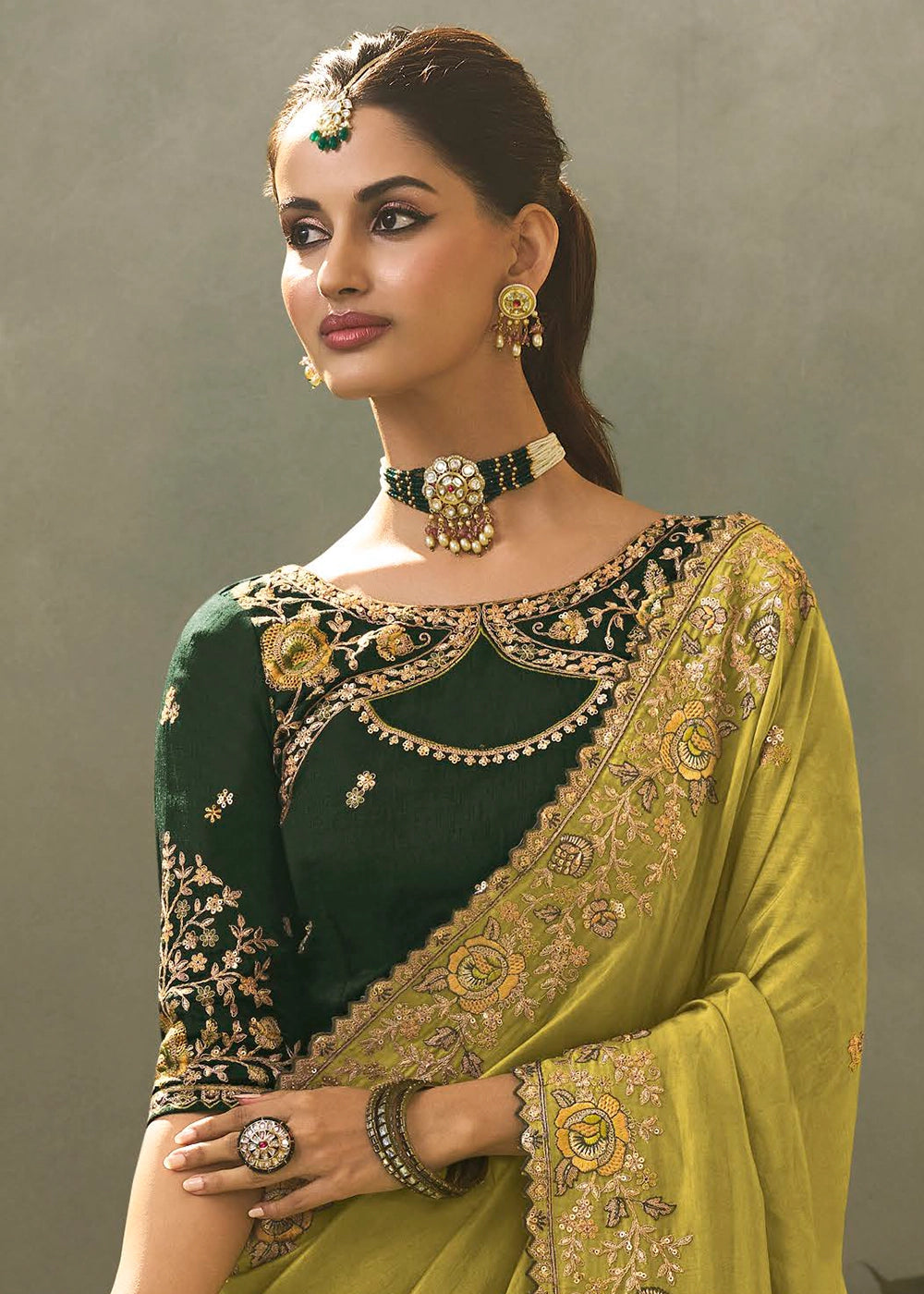 Light Olive Green Uppada Silk Saree with Delicate Embroidered Detailing