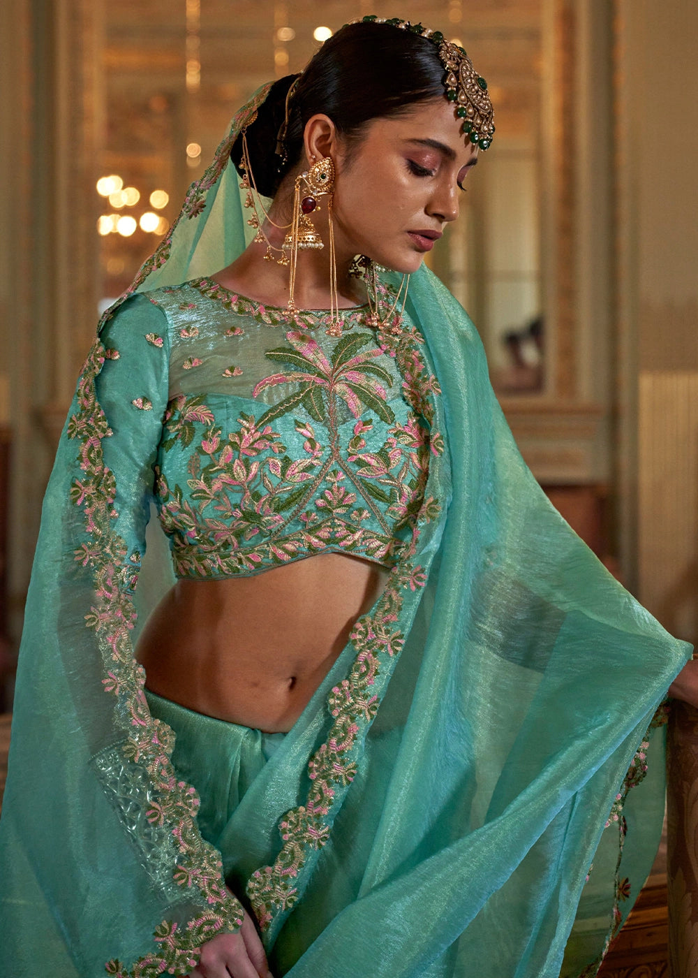 Turquoise Blue Soft Tissue Saree with Exquisite Multi Thread Embroidery work