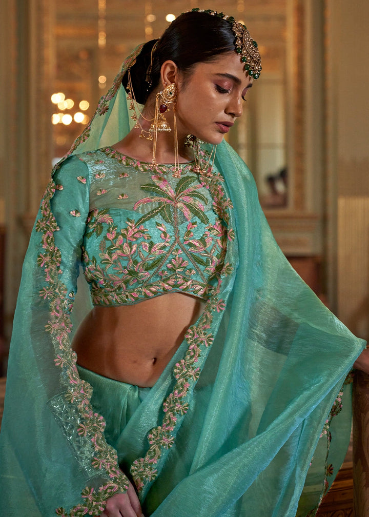 Turquoise Blue Soft Tissue Saree with Exquisite Multi Thread Embroidery work