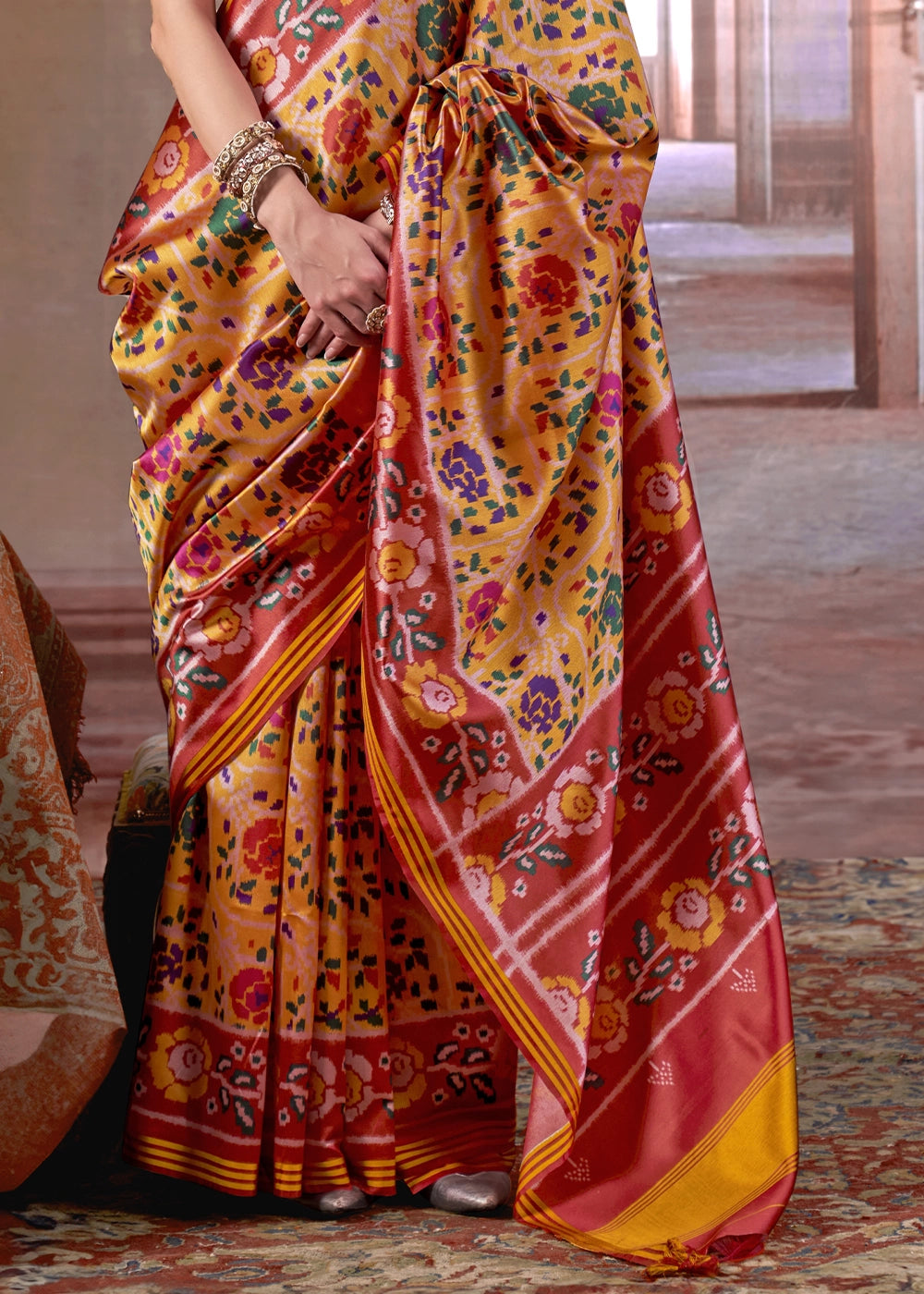 Yellow & Red Patan Patola Printed Silk Saree