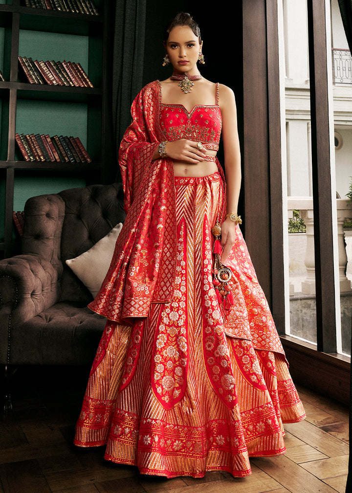 Shades of Red Bridal Lehenga Choli with Intricate Embroidery on Banarasi Silk