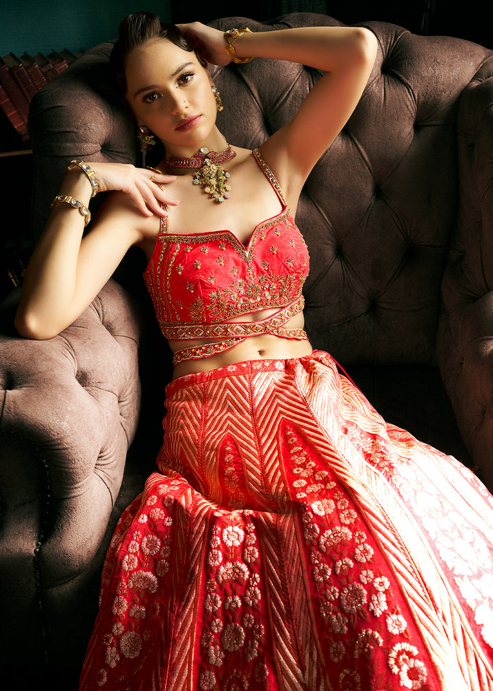 Shades of Red Bridal Lehenga Choli with Intricate Embroidery on Banarasi Silk