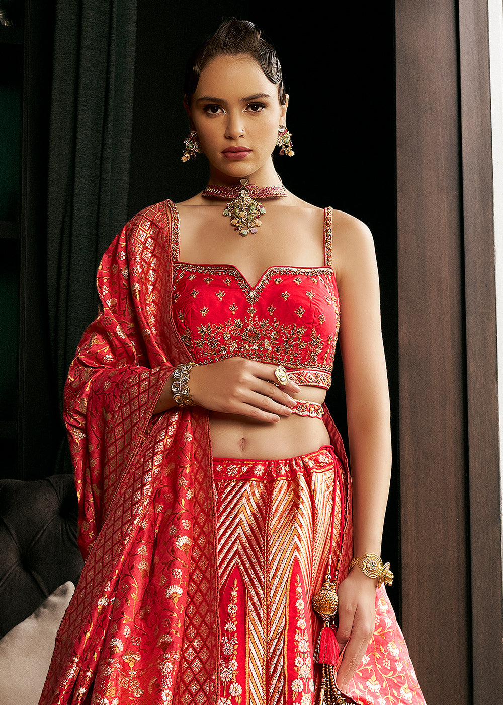 Shades of Red Bridal Lehenga Choli with Intricate Embroidery on Banarasi Silk