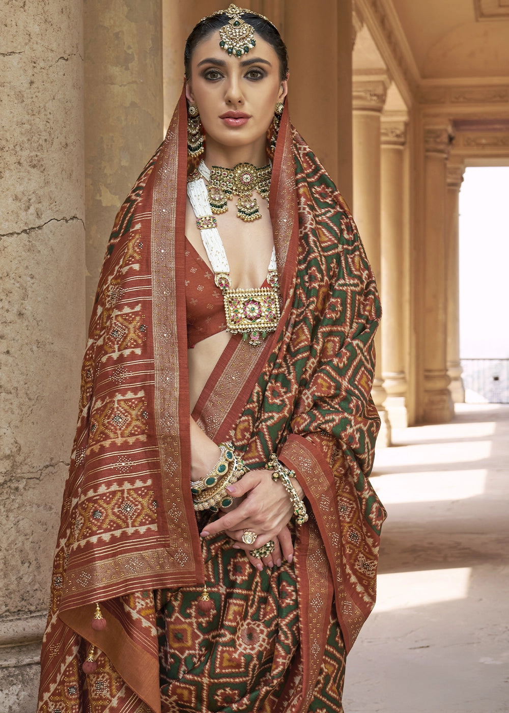 Green & Brown Traditional Patola Printed Silk Saree