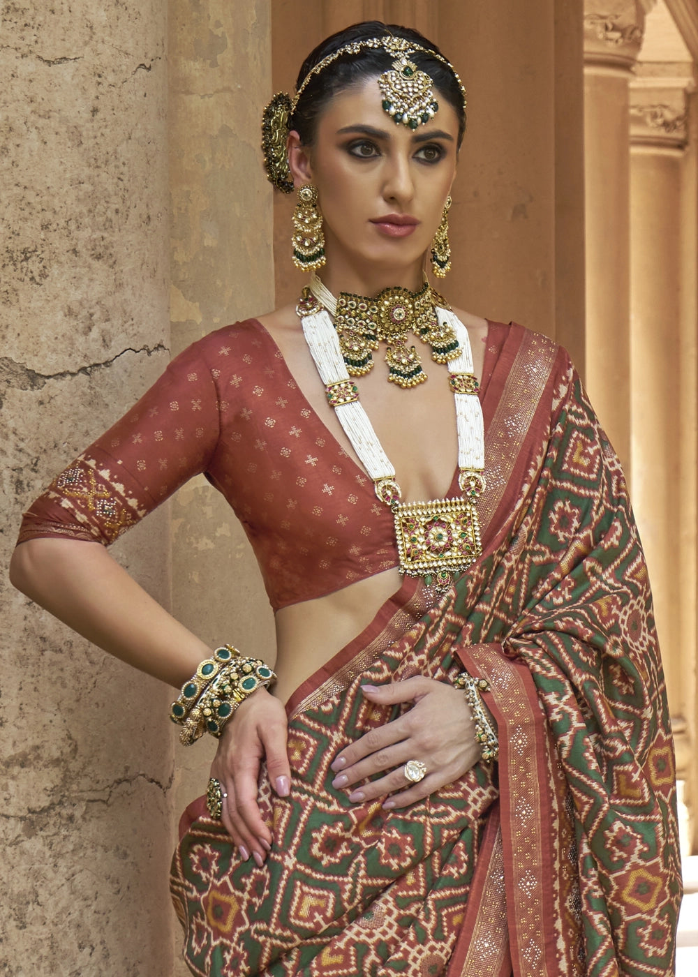 Green & Brown Traditional Patola Printed Silk Saree