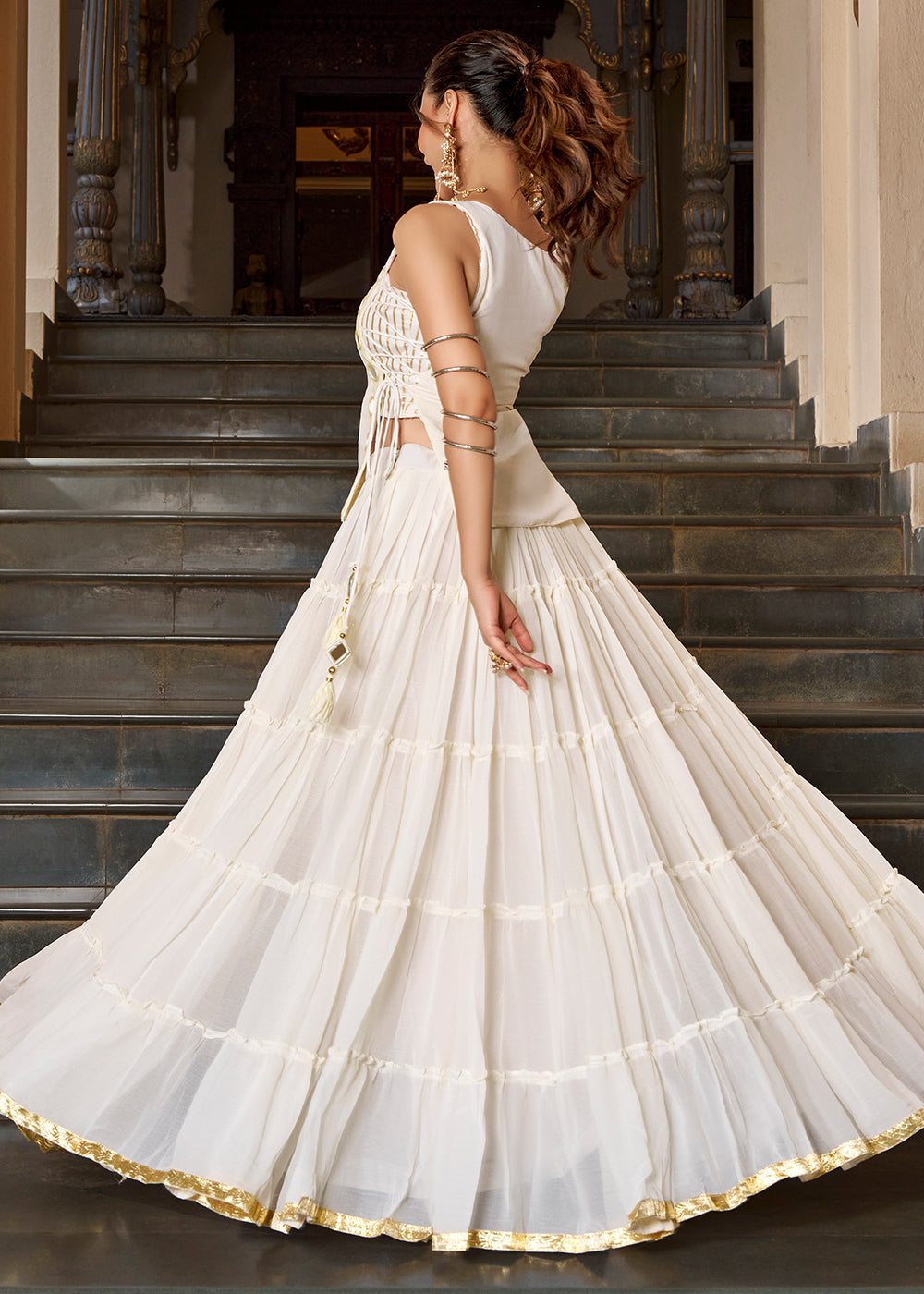 Ivory White & Gold Georgette Navratri Lehenga Choli with Mirror-Detail Koti and Tassels