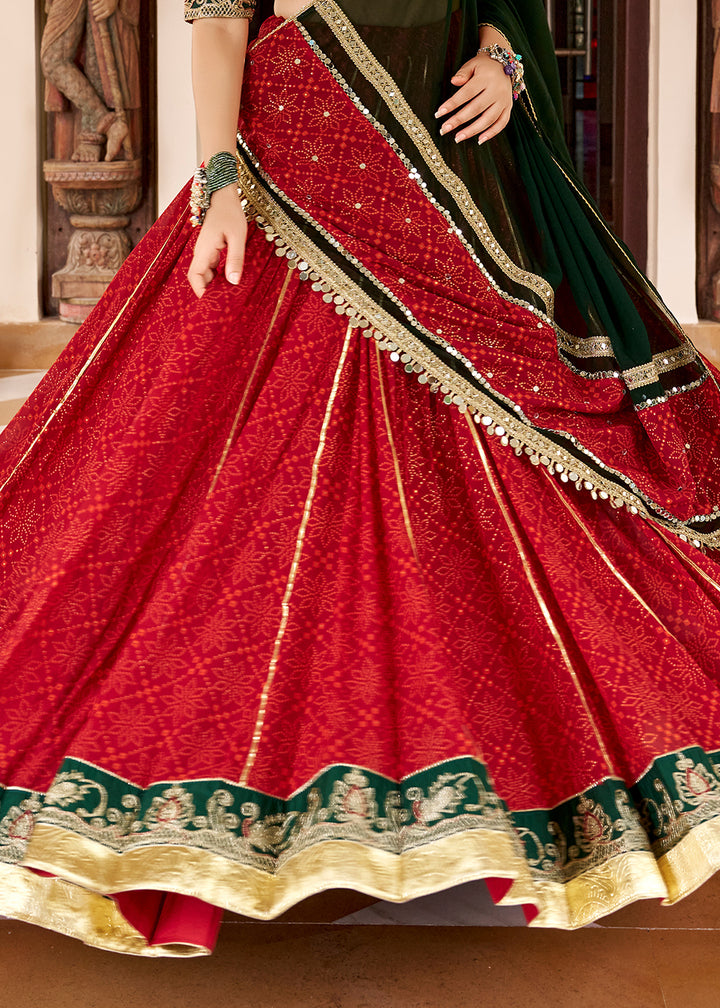 Red &amp; Green Georgette Bandhej Foil Print Navratri Lehenga Choli with Embossed Lace &amp; Gota Patti Detailing