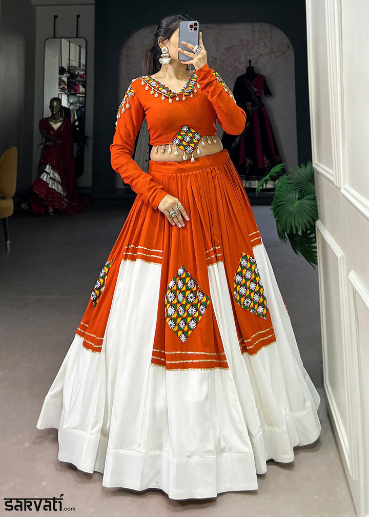Vivid Tangerine &amp; White Rayon Navratri Lehenga Choli with Traditional Gamthi Motifs &amp; Gota Patti Accents