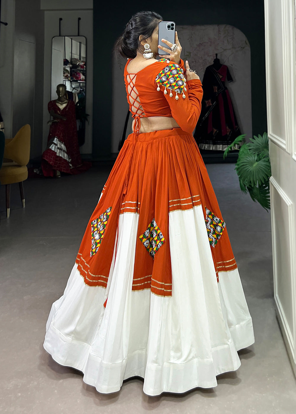 Vivid Tangerine & White Rayon Navratri Lehenga Choli with Traditional Gamthi Motifs & Gota Patti Accents