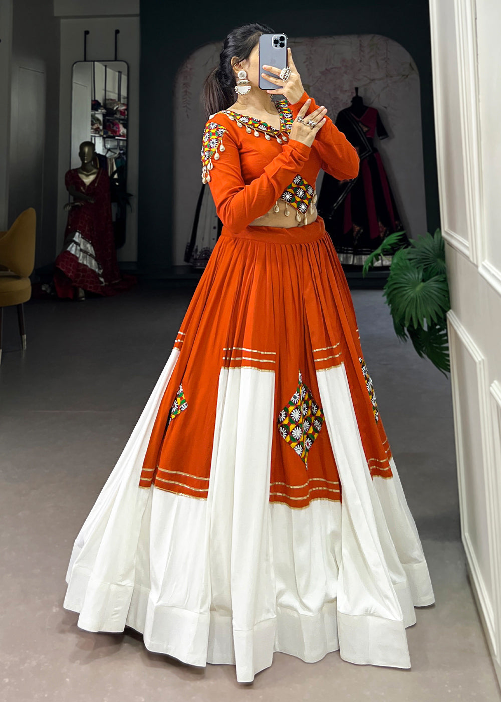 Vivid Tangerine &amp; White Rayon Navratri Lehenga Choli with Traditional Gamthi Motifs &amp; Gota Patti Accents