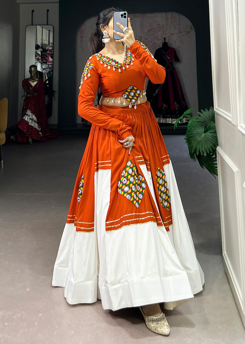 Vivid Tangerine &amp; White Rayon Navratri Lehenga Choli with Traditional Gamthi Motifs &amp; Gota Patti Accents