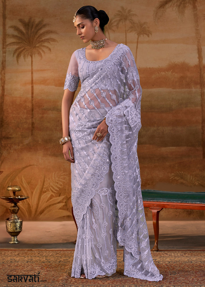 Pastel Purple Net Saree with Embroidery &amp; Sparkling Zarkan