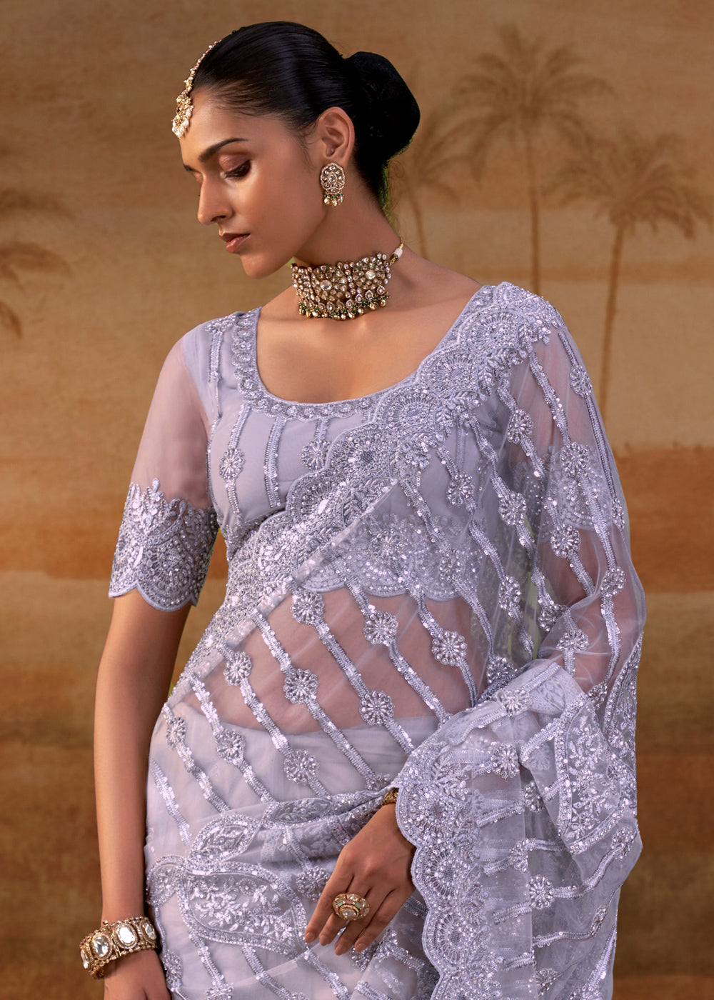 Pastel Purple Net Saree with Embroidery & Sparkling Zarkan