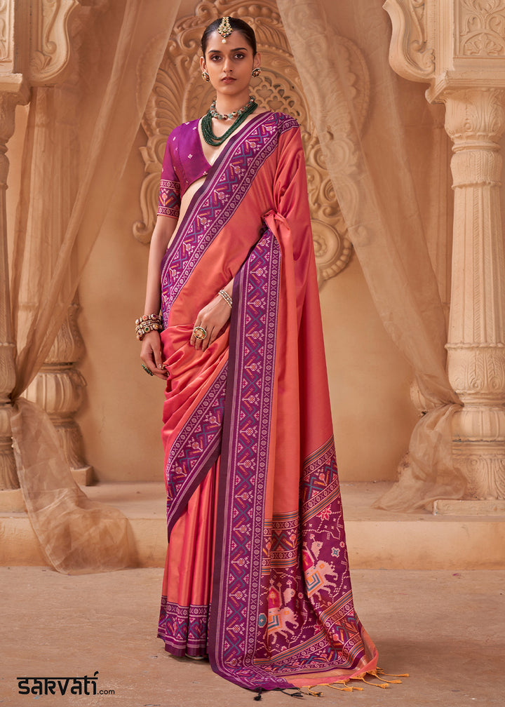 Pinkish Orange Soft Silk Saree with Artistic Patola Motifs