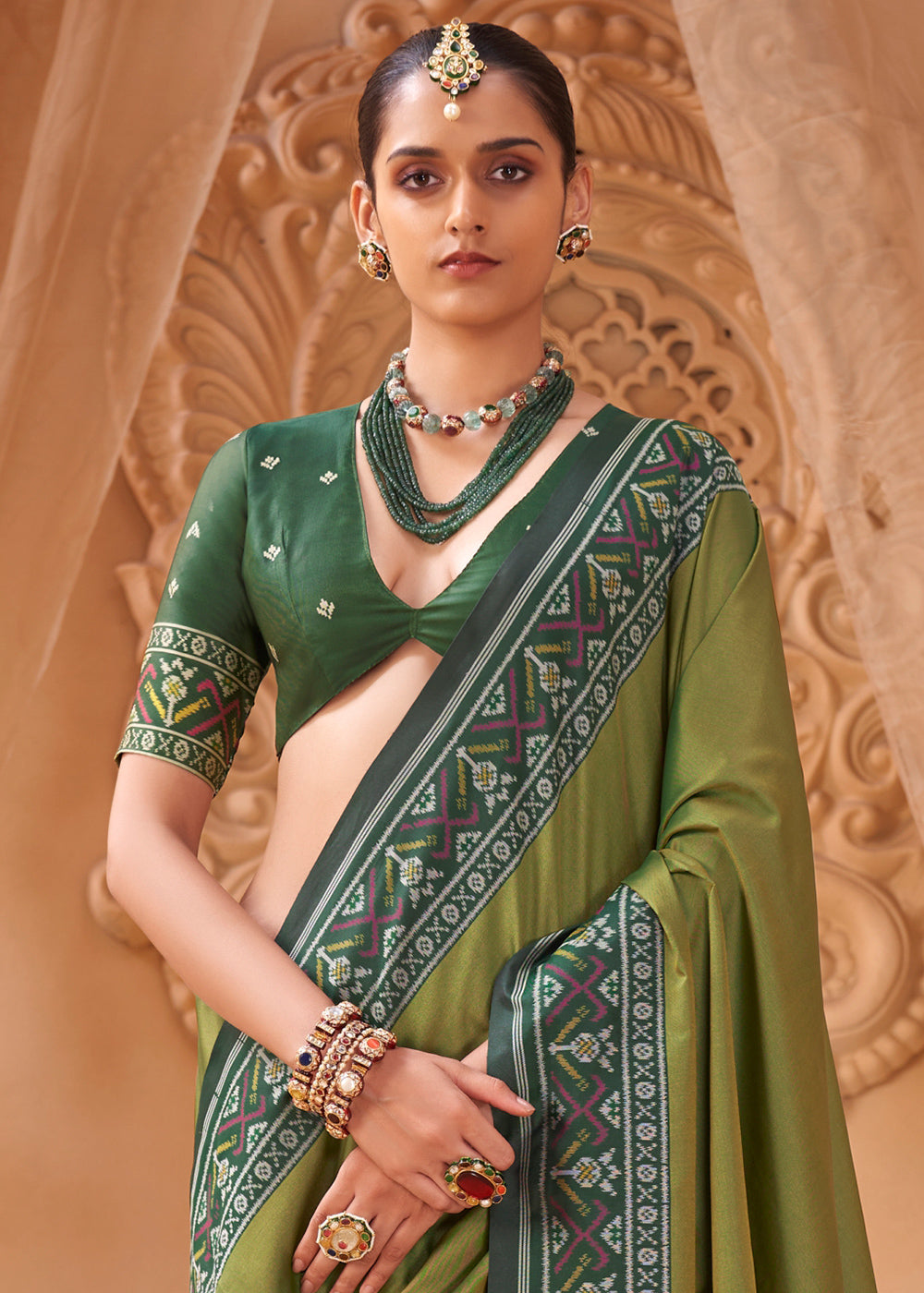 Fern Green Soft Silk Saree with Artistic Patola Motifs