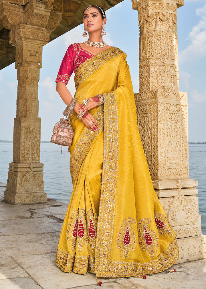 Saffron Yellow Crepe Silk Saree with Intricate Zari,Cut-Dana, Mirror and Zardosi Embellishments