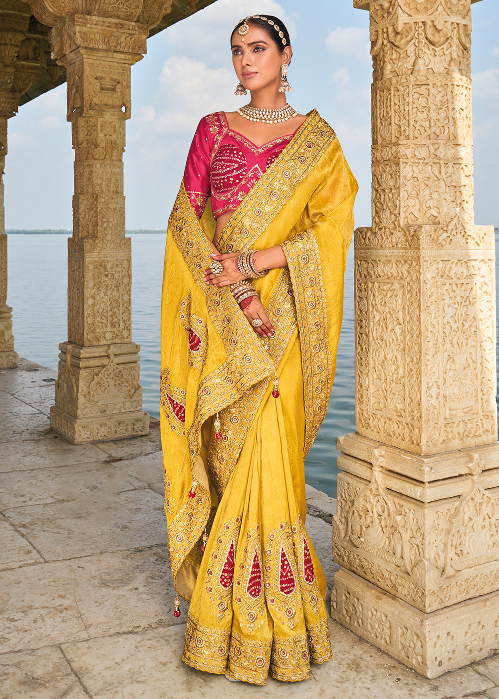 Saffron Yellow Crepe Silk Saree with Intricate Zari,Cut-Dana, Mirror and Zardosi Embellishments