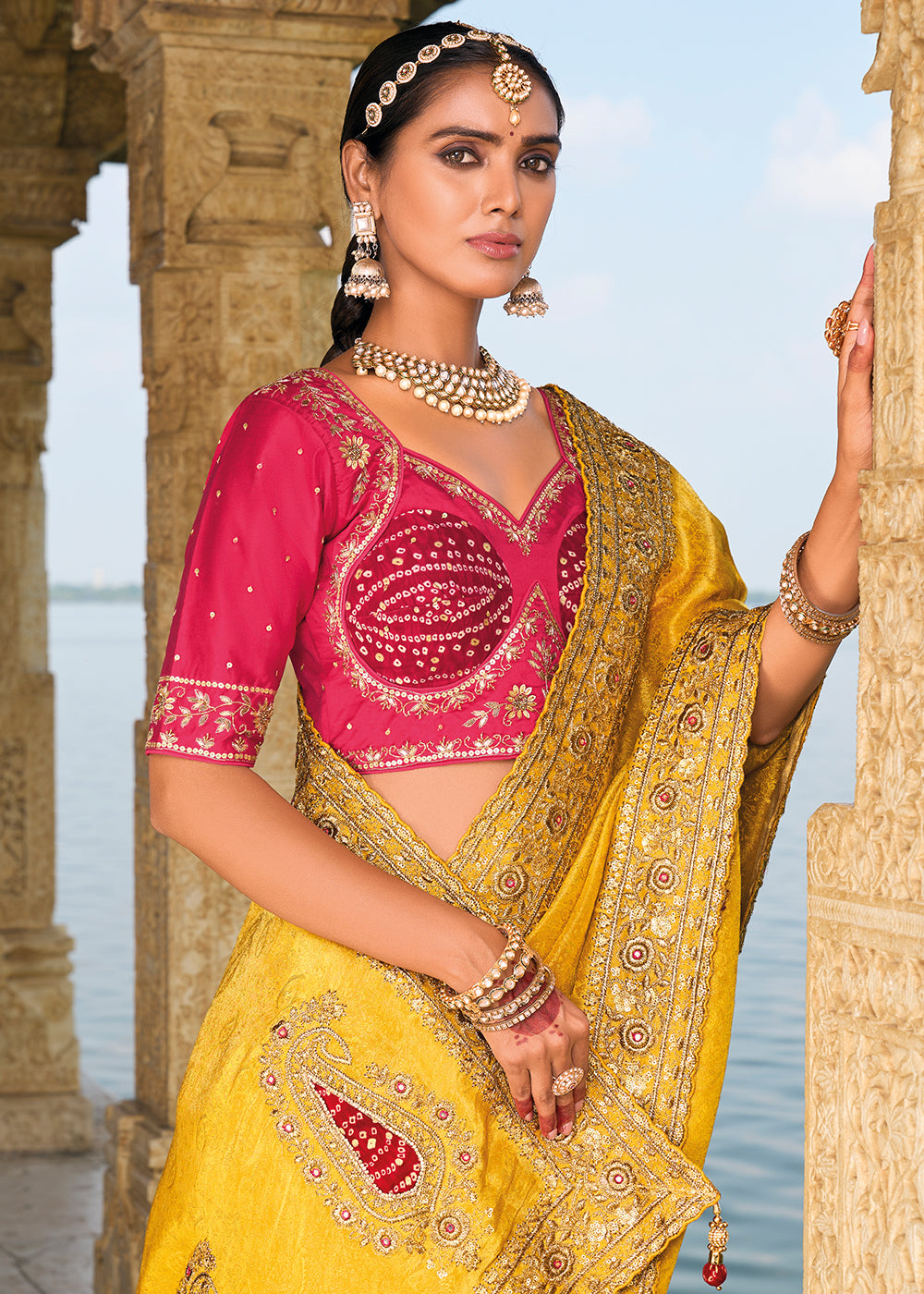 Saffron Yellow Crepe Silk Saree with Intricate Zari,Cut-Dana, Mirror and Zardosi Embellishments