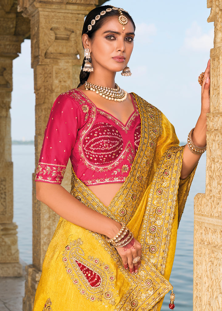 Saffron Yellow Crepe Silk Saree with Intricate Zari,Cut-Dana, Mirror and Zardosi Embellishments