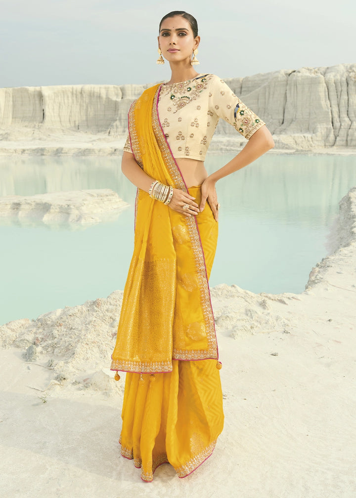 Aureolin Yellow Organza Viscose Saree with Intricate Coding Border and Embroidered Blouse