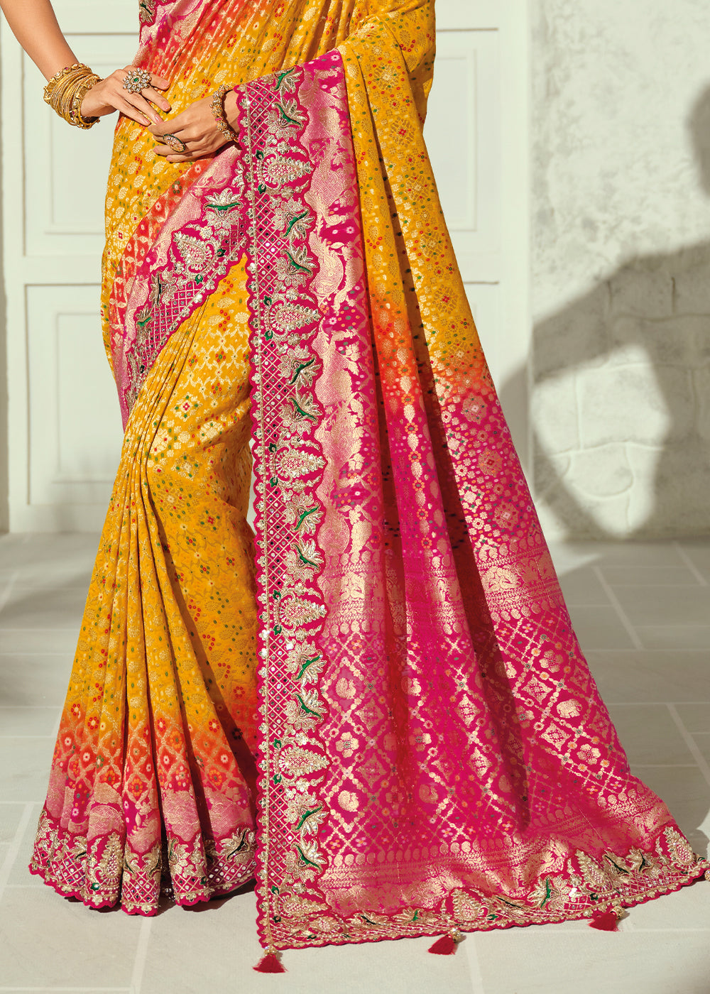 Saffron Yellow Fuchsia Pink Georgette Bandhej Saree with Moti & Cut Dana Mirror, Heavy Handwork Border