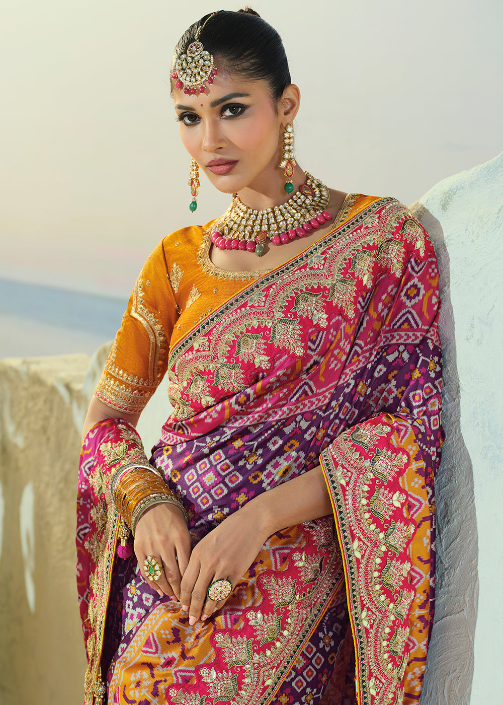 Royal Purple Patola Silk Designer Saree with Mirror, Cut-Dana and Pearl Embroidery