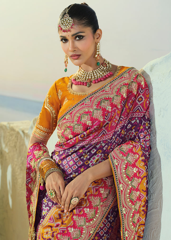 Royal Purple Patola Silk Designer Saree with Mirror, Cut-Dana and Pearl Embroidery