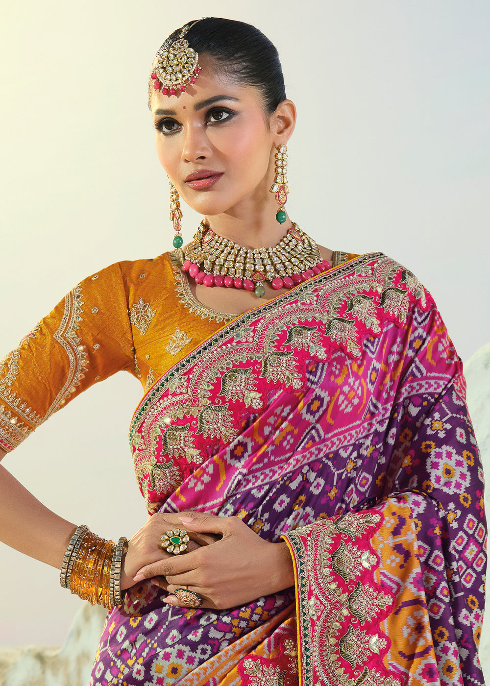 Royal Purple Patola Silk Designer Saree with Mirror, Cut-Dana and Pearl Embroidery