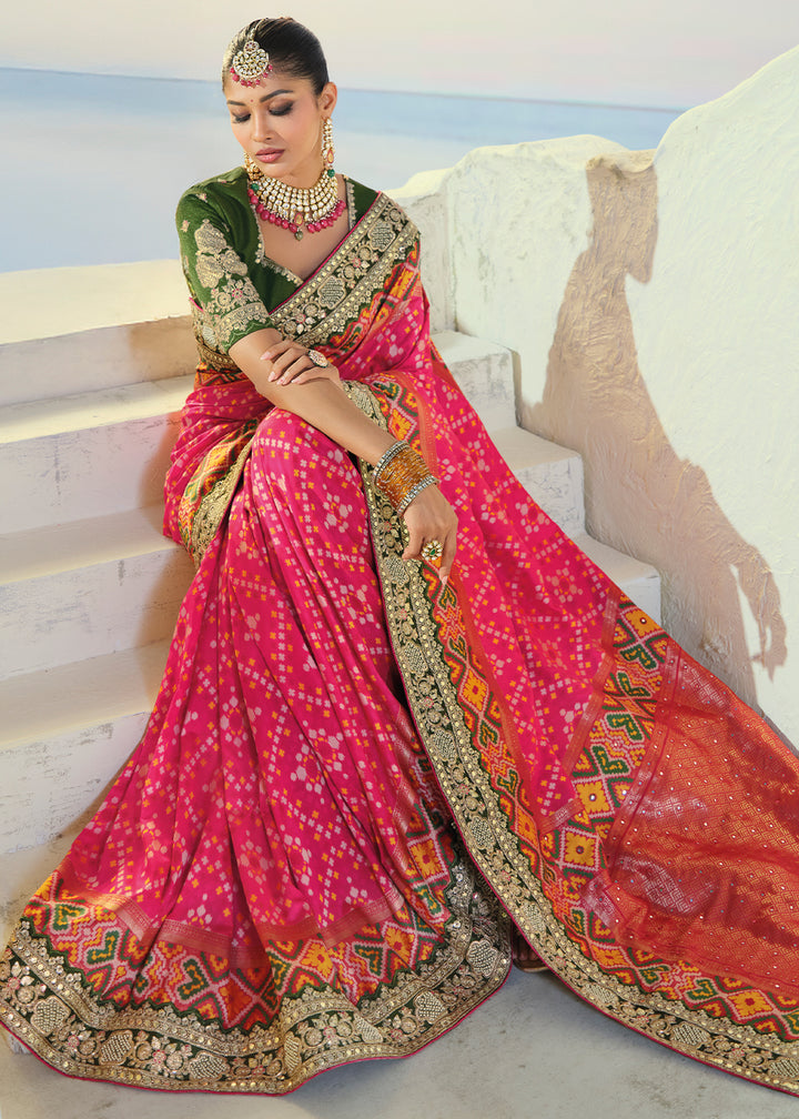 Hot Pink Patola Silk Designer Saree with Mirror, Cut-Dana and Pearl Embroidery
