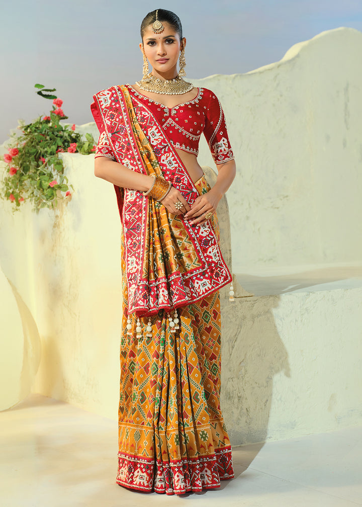 Mustard Yellow Patola Silk Designer Saree with Mirror, Cut-Dana and Pearl Embroidery