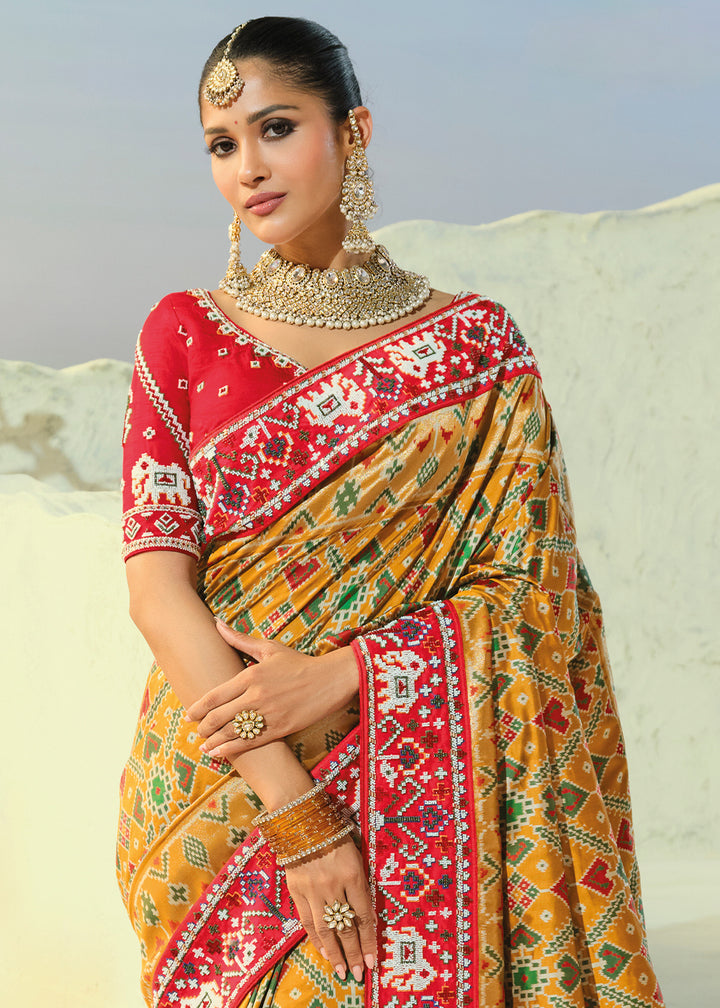 Mustard Yellow Patola Silk Designer Saree with Mirror, Cut-Dana and Pearl Embroidery