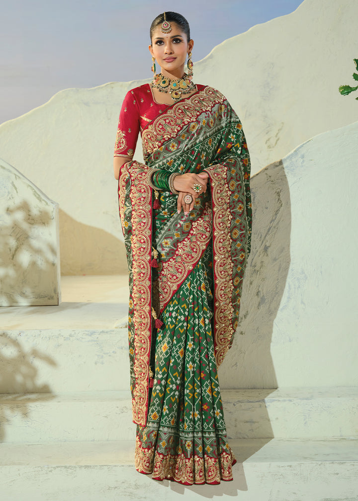 Bottle Green Designer Patola Silk Wedding Saree with Cut Dana and Mirror Embroidery