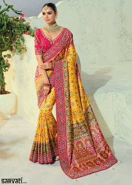 Golden Yellow and Fuchsia Pink Patola Silk Designer Saree with Cut-Dana and Mirror Embroidery