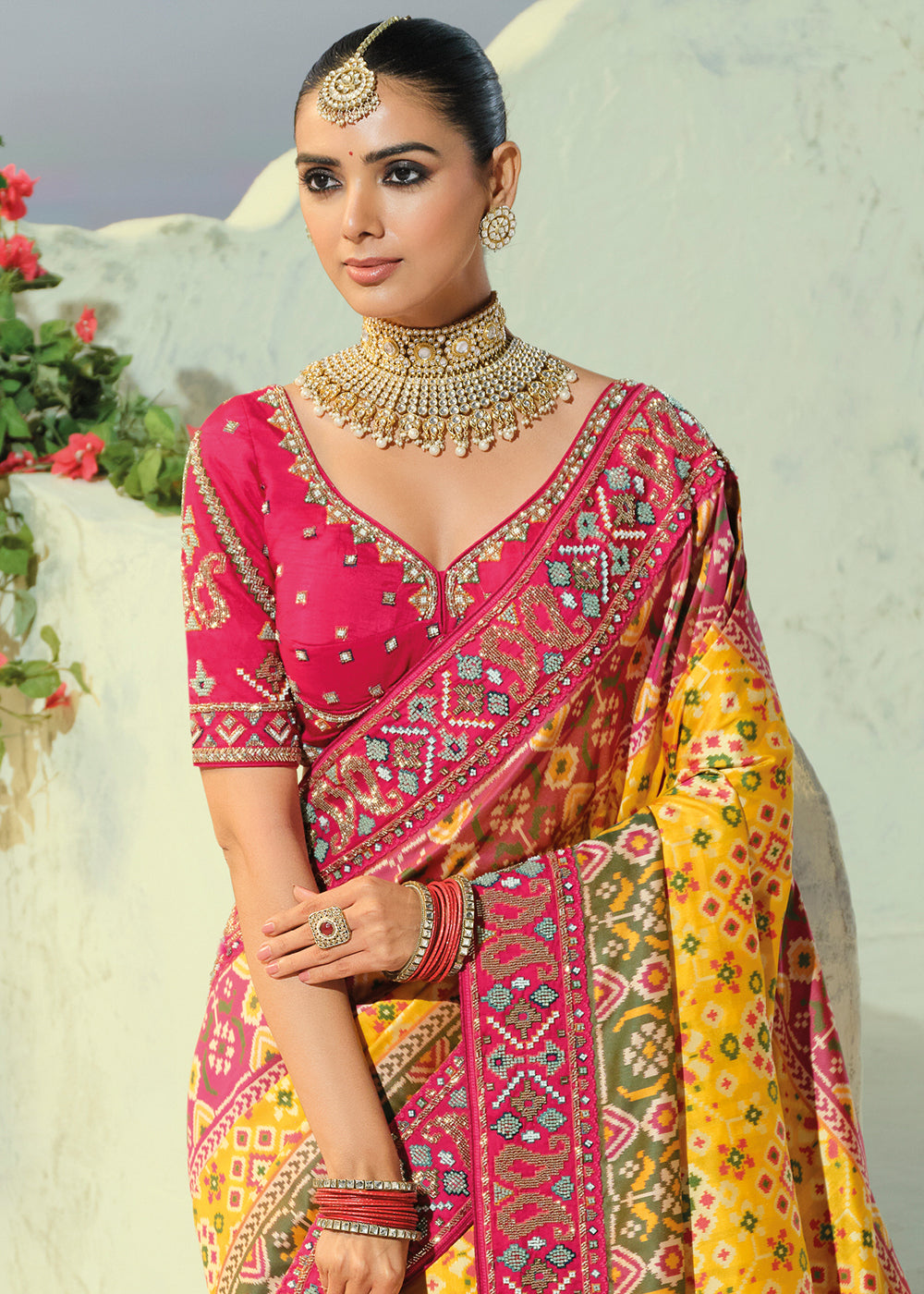 Golden Yellow and Fuchsia Pink Patola Silk Designer Saree with Cut-Dana and Mirror Embroidery