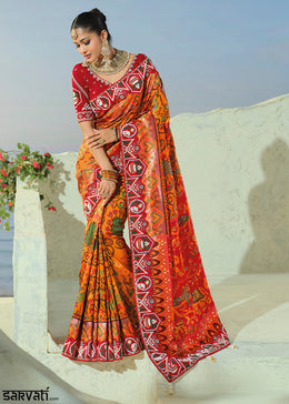Marigold Orange and Red Patola Silk Designer Saree with Cut-Dana and Mirror Embroidery