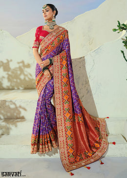 Royal Purple and Red Patola Silk Designer Saree with Cut-Dana and Mirror Embroidery