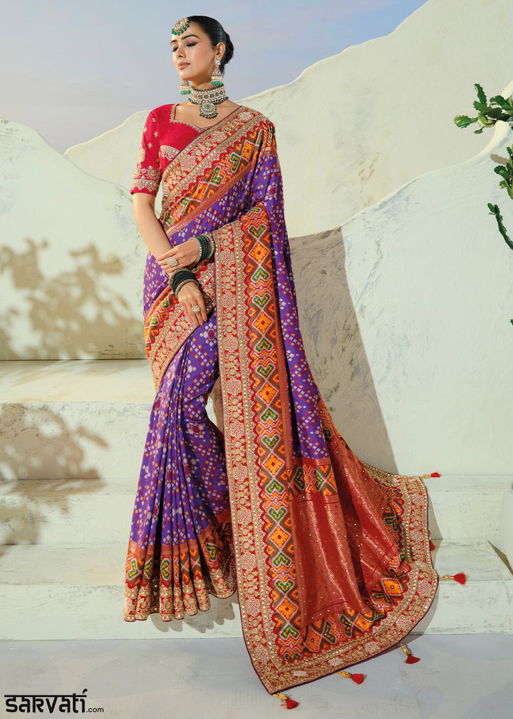 Royal Purple and Red Patola Silk Designer Saree with Cut-Dana and Mirror Embroidery