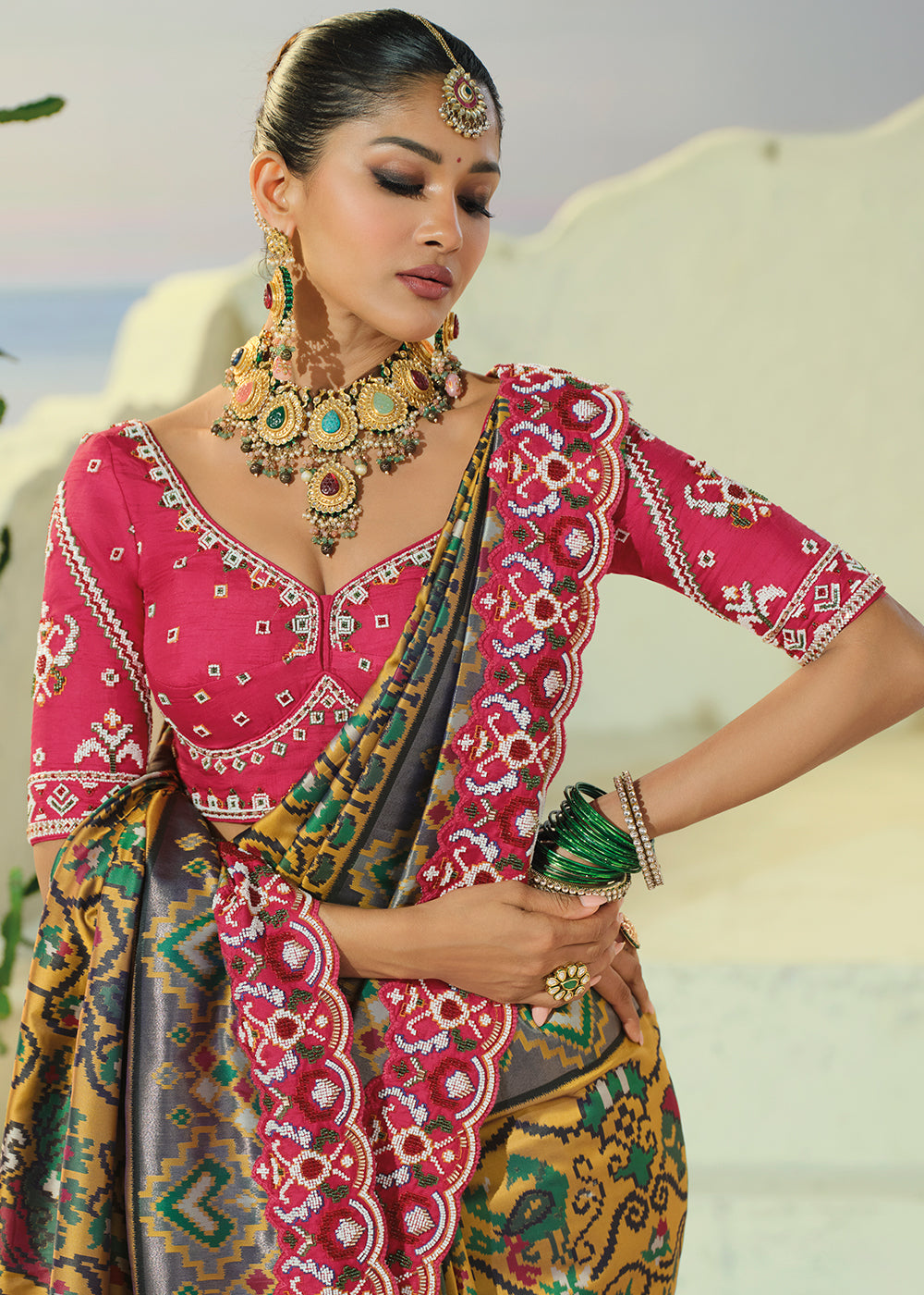 Mustard Yellow and Teal Green Patola Silk Designer Saree with Cut-Dana and Mirror Embroidery