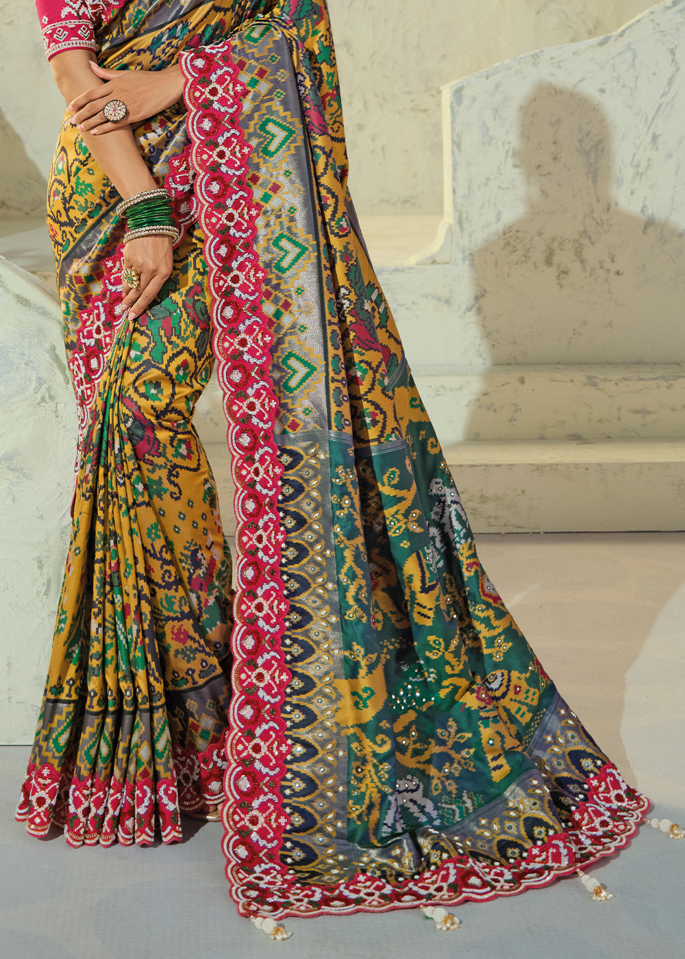 Mustard Yellow and Teal Green Patola Silk Designer Saree with Cut-Dana and Mirror Embroidery