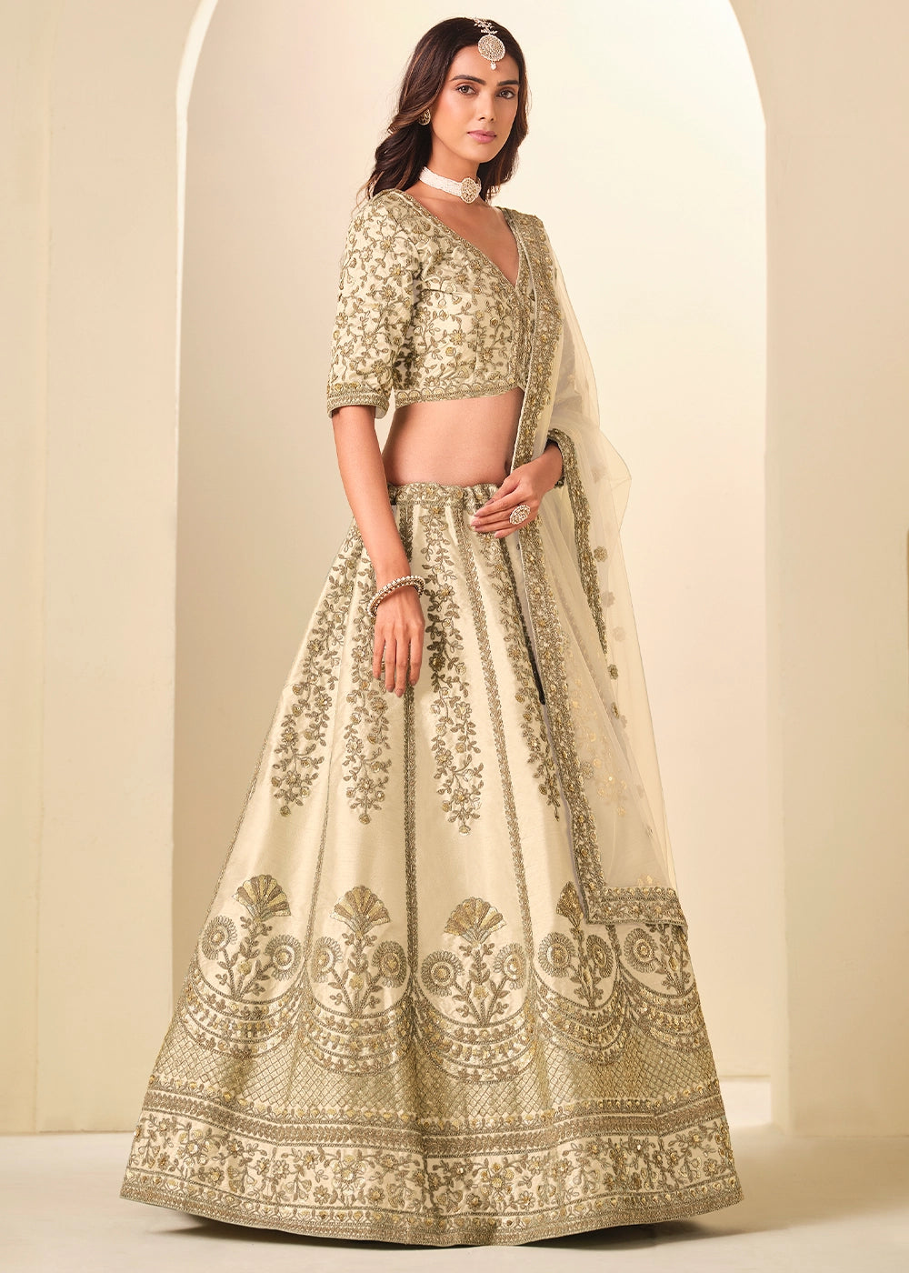 Cream White Wedding Wear Silk Lehenga Choli with Embellished Detailing