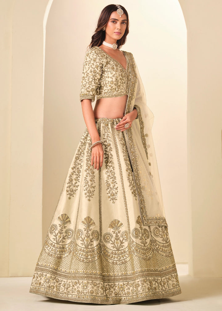 Cream White Wedding Wear Silk Lehenga Choli with Embellished Detailing